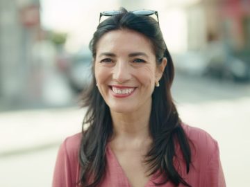 Middle,Age,Hispanic,Woman,Smiling,Confident,Standing,At,Street